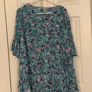 Aqua tunic length blouse with flounce sleeves. Lightweight gauze material